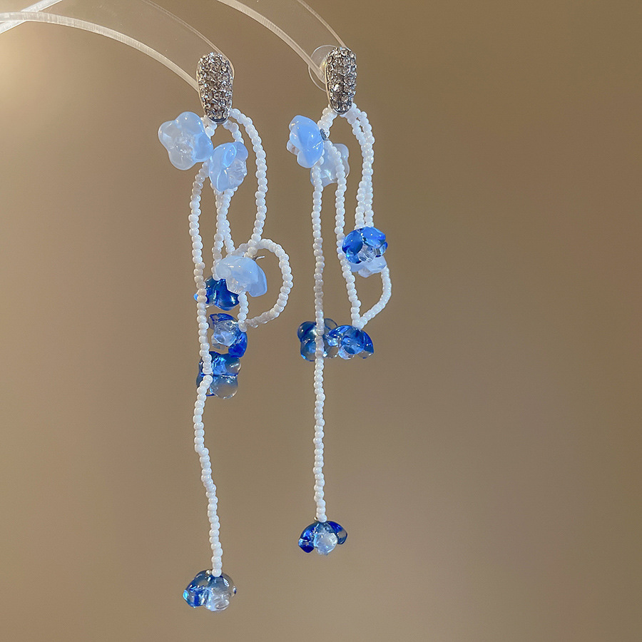 Pendientes de borla de cuentas de arroz de flor de gasa de aguja de plata Pendientes de todo fósforo de estilo de vacaciones Pendientes frescos y dulces para mujer