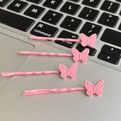 Pink bow-shaped hair clip with a "girl-next-door" vibe—Instagram-inspired edgy yet sweet mini Y2K-style retro hair accessory