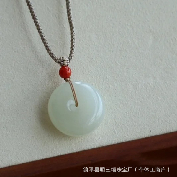 Protective amulet from Khotan district white jade