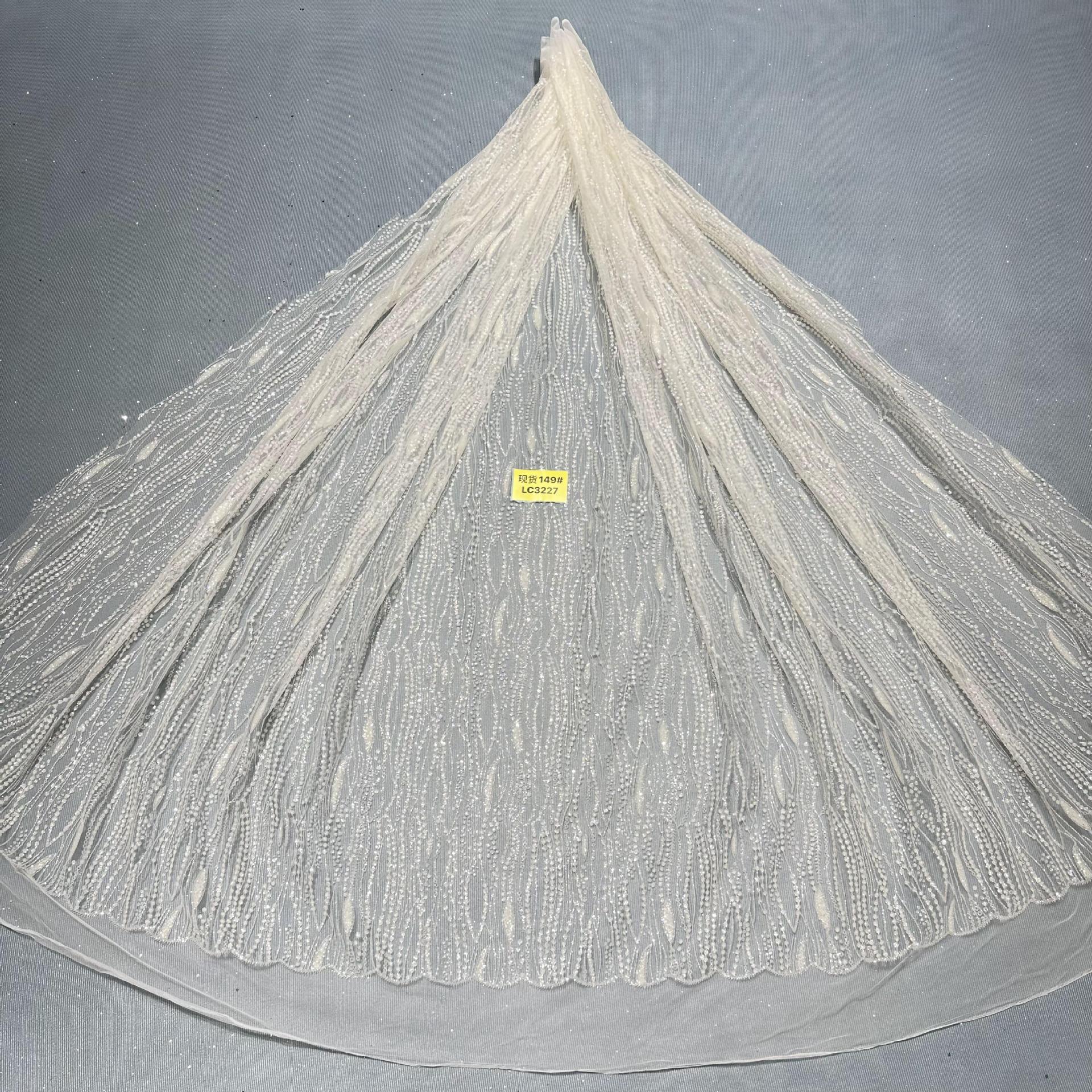 现货洒金花型款花型149#LC3227婚纱礼服面料 网纱 喷金花型面料