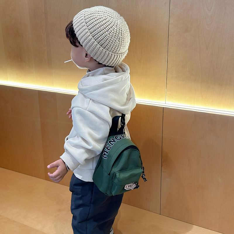 Mini bolso coreano para niños y niñas, letras extranjeras, insignia para bebés, bolso de cambio 2025, nuevo bolso para niños de comercio exterior