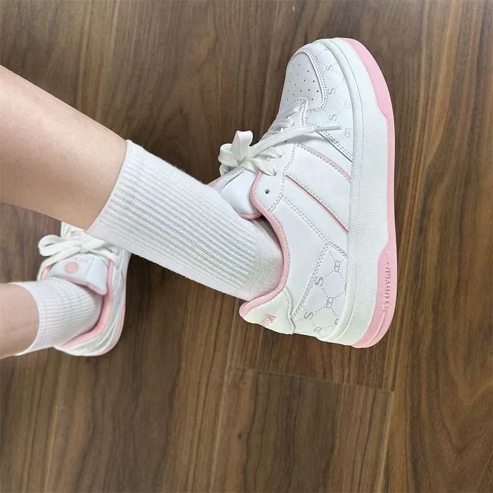 Versión coreana de las zapatillas de deporte azul hielo de suela gruesa de nicho para mujer. Ins marea 2025 primavera nuevos zapatos blancos casuales deportivos de todo fósforo