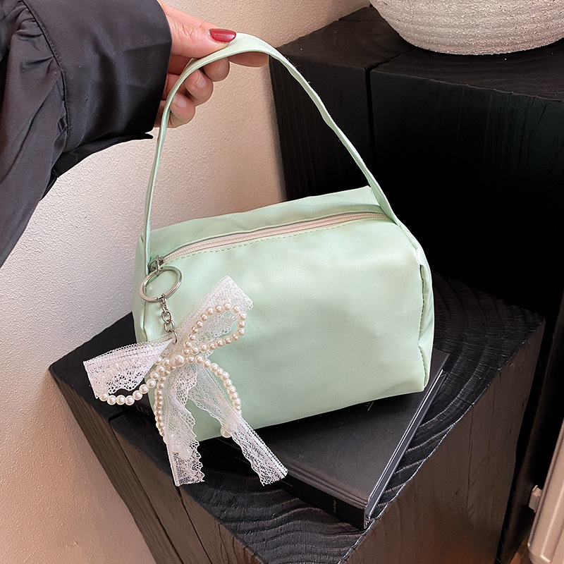 Bolsas de brazo populares de este año, bolsas de moda de moda coreana, bolsas pequeñas de primavera y verano 2025, bolsas de mujer casuales de nicho de moda.