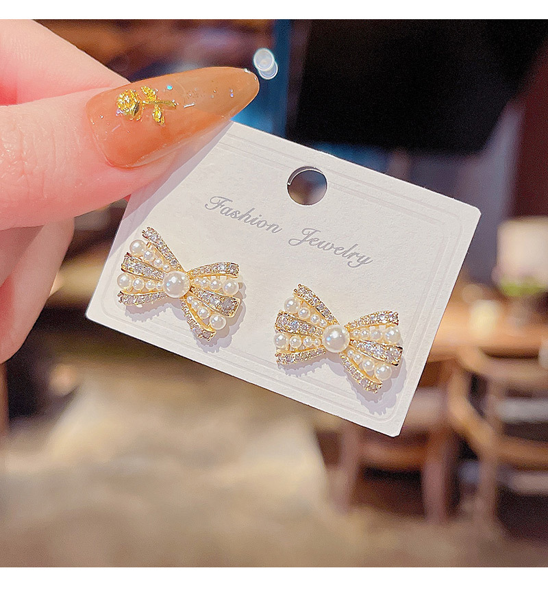 Korean New Copper Micro-encrusted Diamond Bow Stud Earrings display picture 2