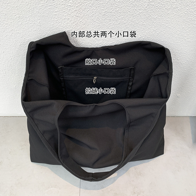 秋冬キャンバスバッグ黒色アルファベットベストバッグ大容量旅行休暇バッグ学生授業バッグバッグショッピングバッグ