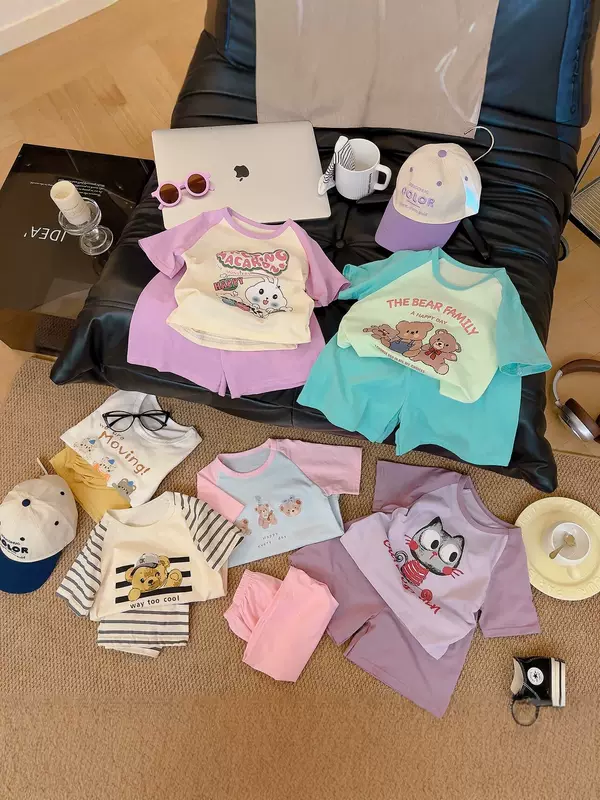 New cartoon raglan short-sleeve set for children, summer two-piece outfit for boys and girls, cute printed children's clothing, trendy and available for wholesale