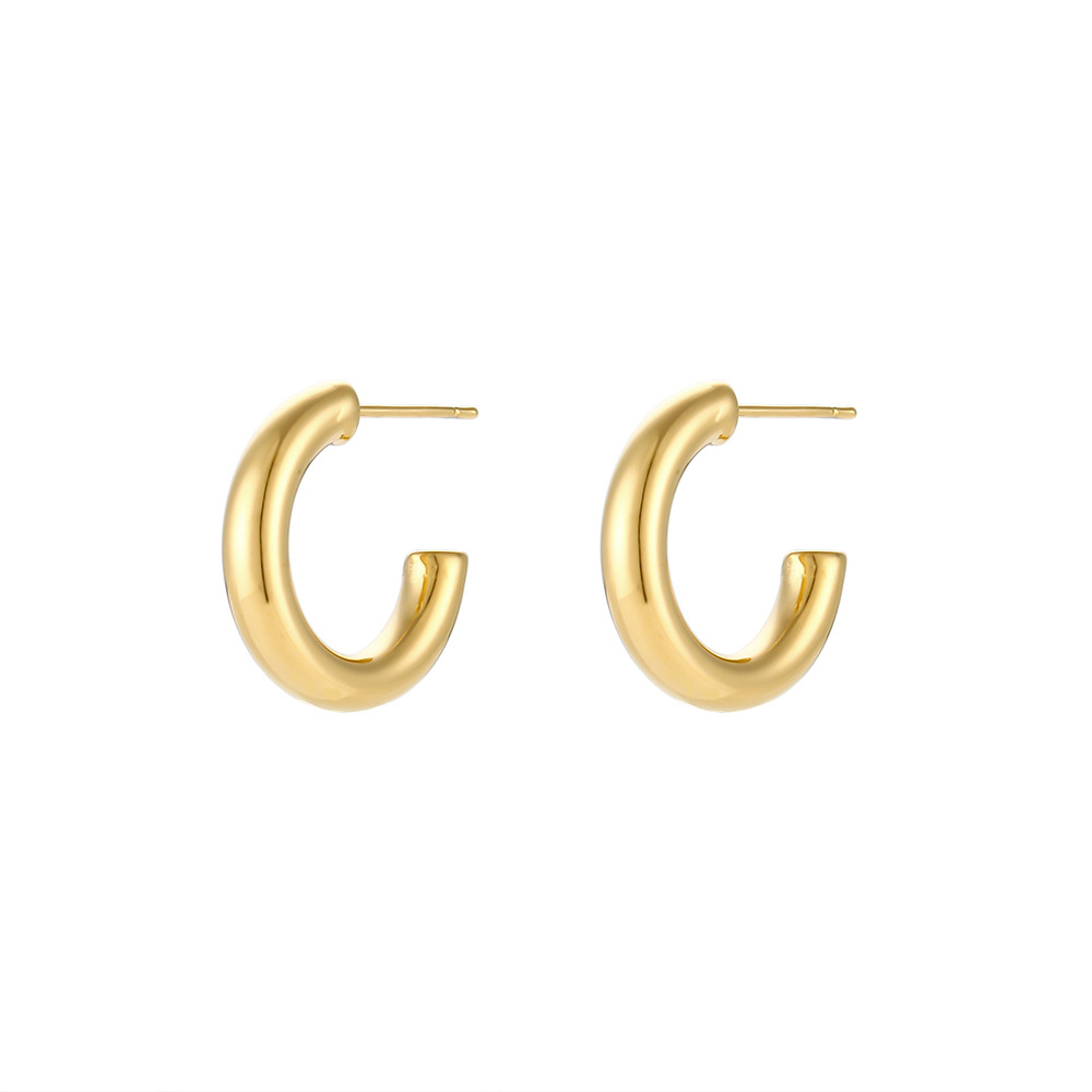 Europeo y americano ins simple titanio acero grueso cilíndrico hueco pendientes mujer de acero inoxidable chapado 18K sólido brillante pendientes de la joyería