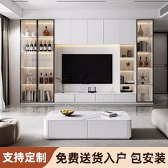テレビの棚の背景の壁の一体の客間の本棚の酒の棚は壁のロッカーの家庭の実木のテレビのキャビネットに寄りかかっています。