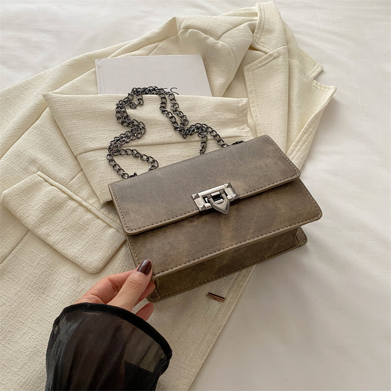 Bolsa de mochila de textura retro para mujeres 2024 nueva cadena coreana bolso cuadrado red rojo aire de viaje bolsa de hombro de moda