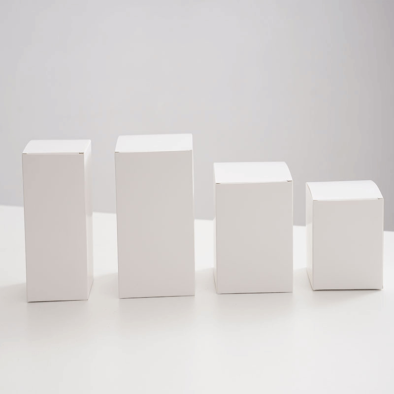 Caja blanca pequeña universal caja vacía caja de embalaje de cartón blanco caja de tarjeta cuadrada en blanco caja de color de cosméticos en stock al por mayor