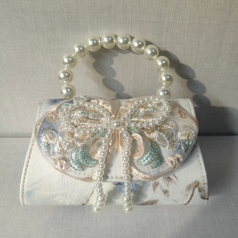 2025 primavera y verano estilo caliente moda casual niños dulces bolsa de gelatina mini bolso de mensajero de un solo hombro variedad al por mayor