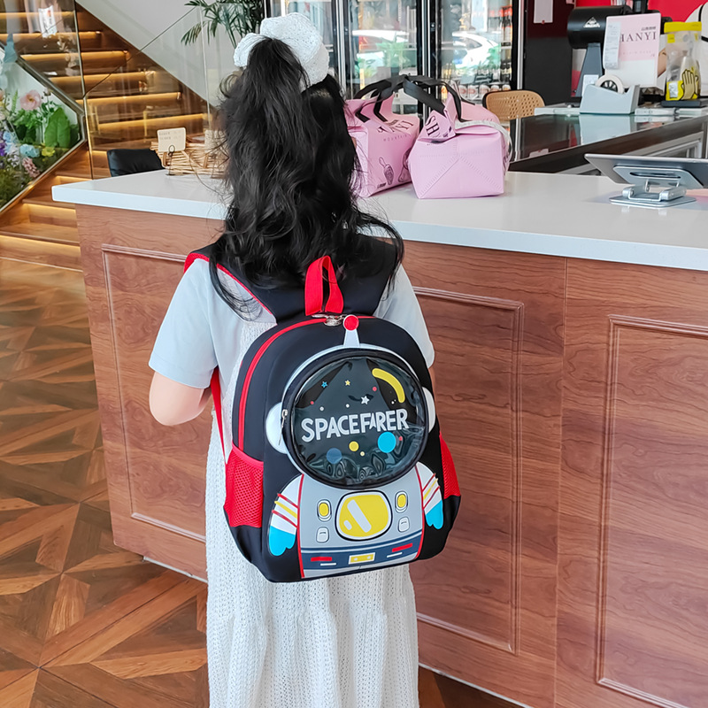 Jardín de infantes bolsas escolares de dibujos animados astronautas gran capacidad mochila de niños y niñas impresión de aire extranjero mochila infantil