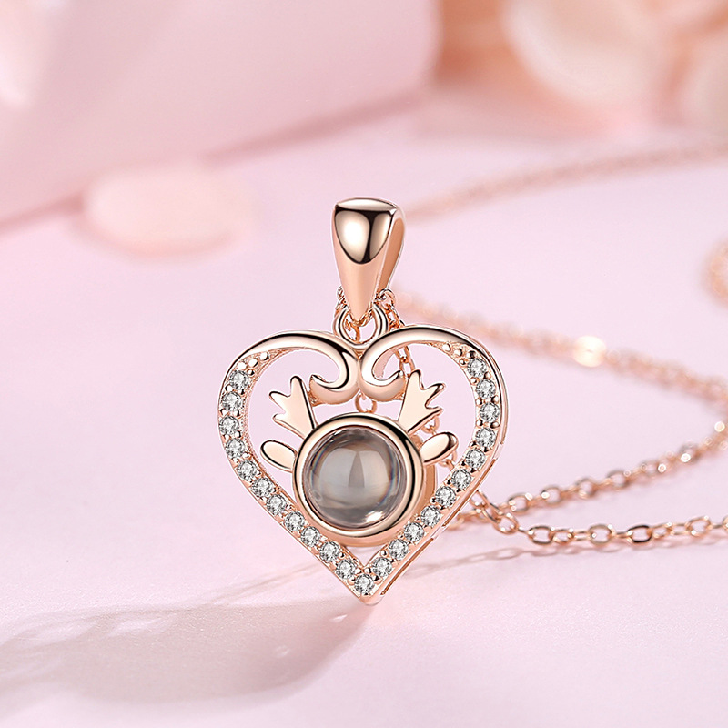 S925 plata un ciervo te tienen 100 idiomas te amo collar de proyección amor femenino en forma de corazón diamante incrustado corbata joyería