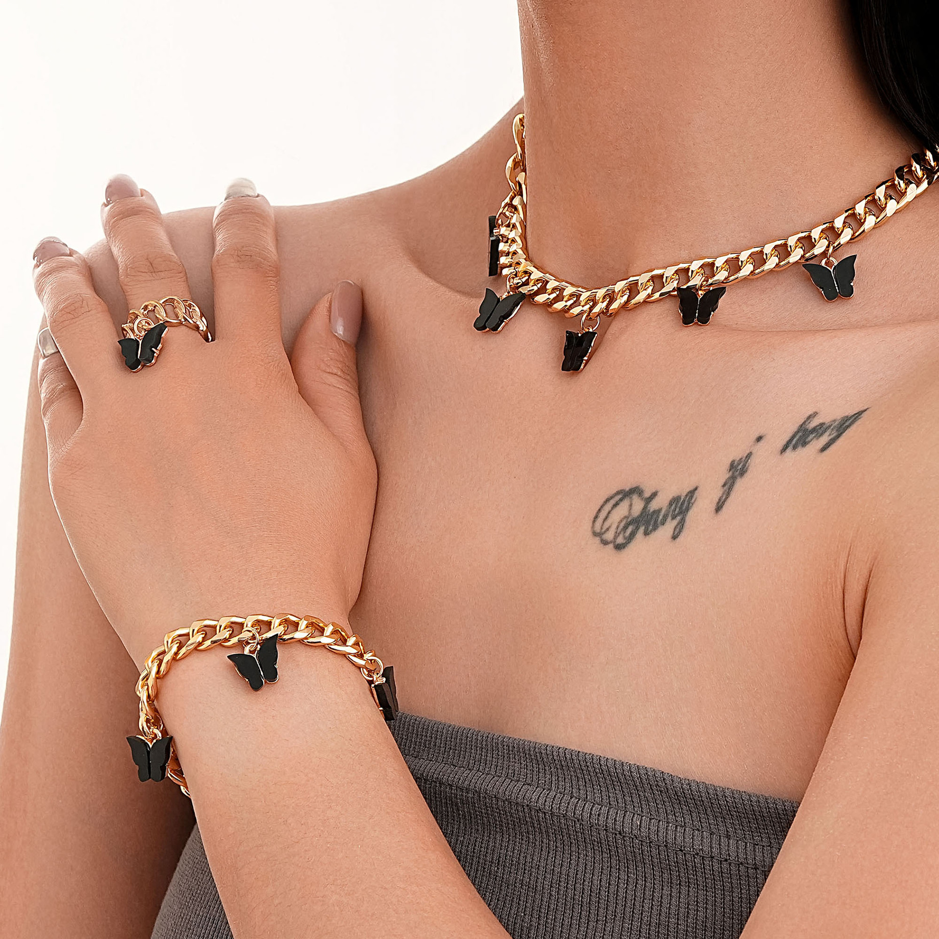 Set di gioielli in acrilico con catena a artiglio e diamanti_voghion.com
