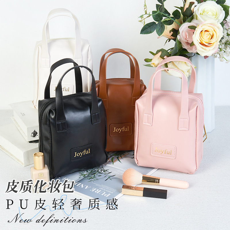 新しいクロスボーダーハンドメイドの見栄えの良いPU化粧品バッグ、ポータブル化粧品収納バッグ、旅行用大容量トイレタリーバッグ|undefined