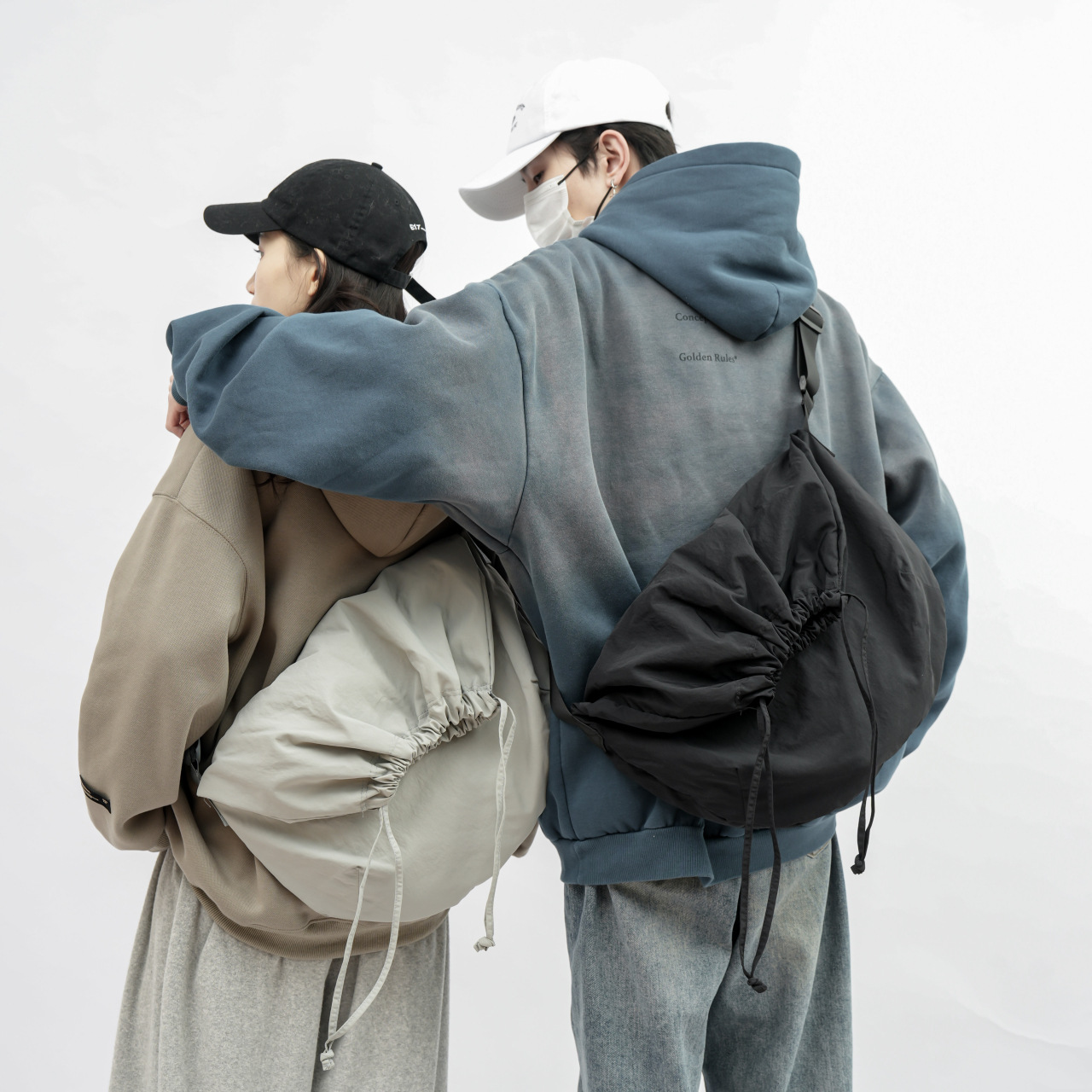 Bolso de cuerda simple nuevo bolso de hombro de color sólido para mujeres versión coreana de bolso retro tote para estudiantes universitarios con bolsos correccionales para hombres de moda