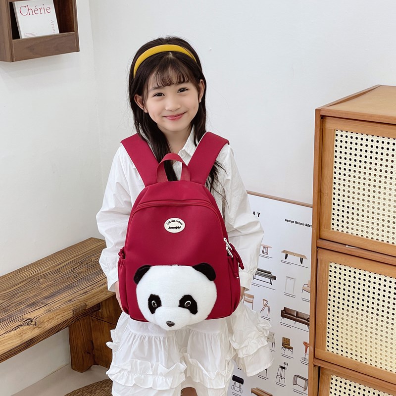 Escuela de jardín de infantes escuela primaria mochila de dibujos animados lindo panda macho y hembra mochila 2025 nueva moda de mochila para niños