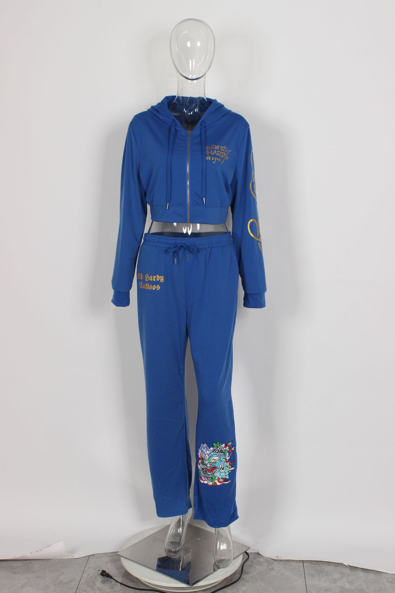 Conjunto de dos piezas para mujer, cárdigan corto básico con cremallera y estampado de calavera y corazón de Brand Street, pantalones rectos de cintura alta