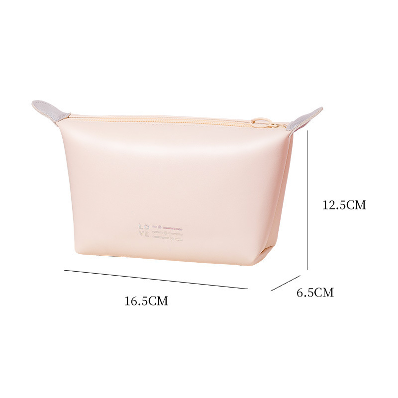 Nuevo corazón dumpling bolsa impermeable bolsa de cosméticos bolsa de lavado conveniente bolsa de almacenamiento de mano bolsa de cosméticos de color caramelo al por mayor