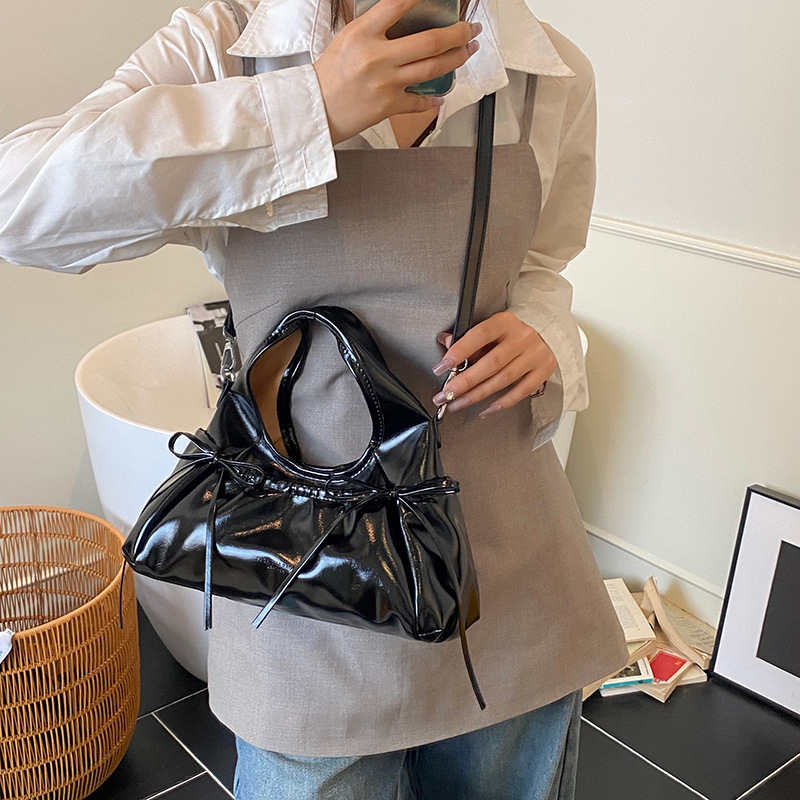 Bolso de moda coreano 2025 verano nuevo bolso femenino lindo lazo bolso de hombro casual letra bandolera