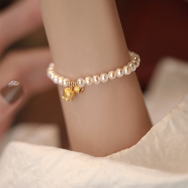 The Everlasting Lily of the Valley Happiness Bracelet with 4-5mm High-Quality Freshwater Pearls Is a Versatile Accessory for Women