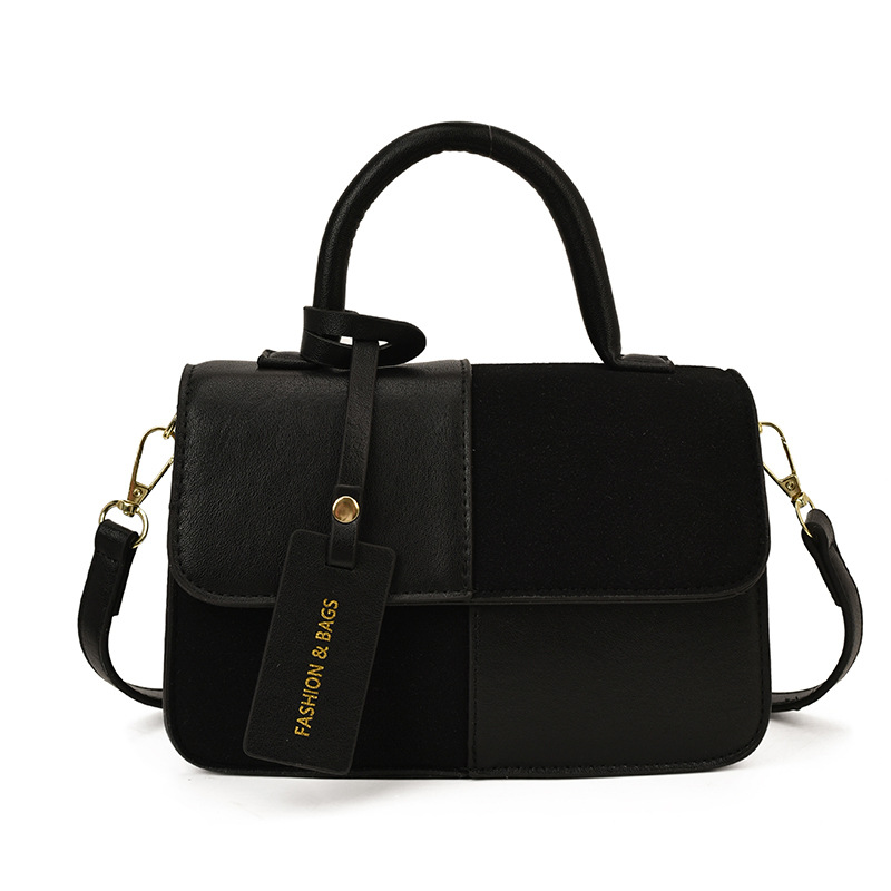 Bolsos de mano de textura alta para mujeres 2025 nueva tendencia europea y americana cruzada retro empalme versátil mochila