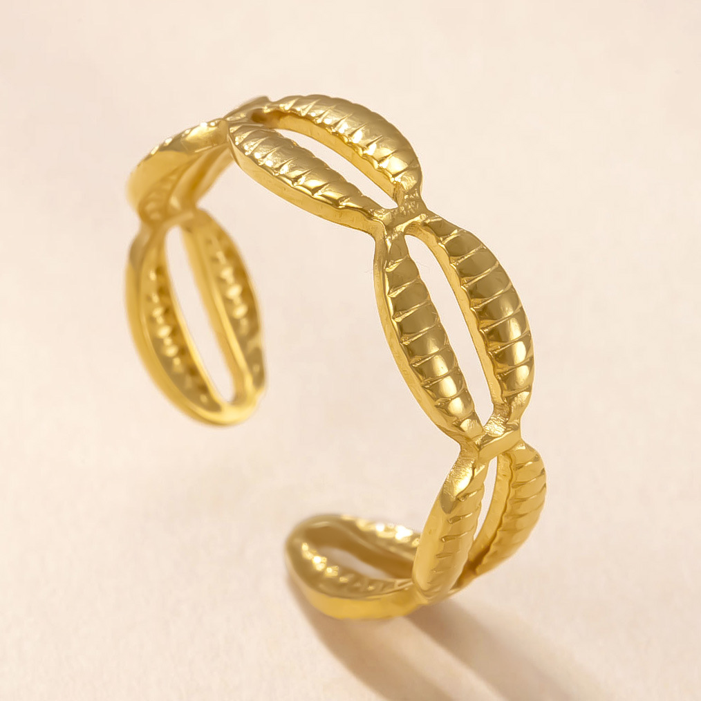 Anillo de acero inoxidable europeo y americano Moda femenina Anillo de estrella de mar hidráulico geométrico Chapado en oro de 18 quilates Anillo de amor Joyas de acero de titanio