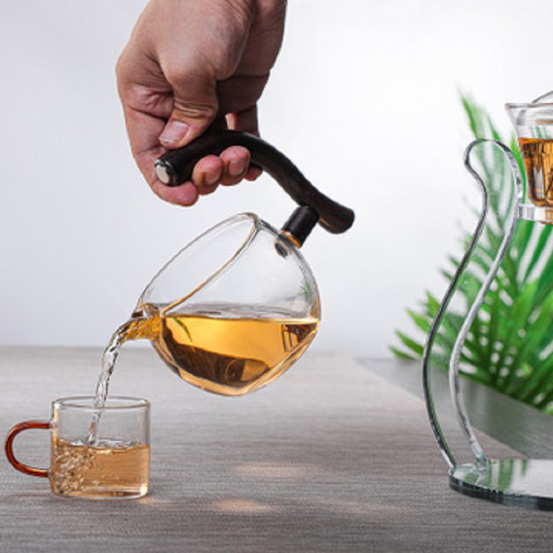 Fábrica al por mayor de vidrio transparente fabricante de té traje de succión magnética juego de té perezoso fabricante de té con soporte Palacio Lámpara juego de té traje