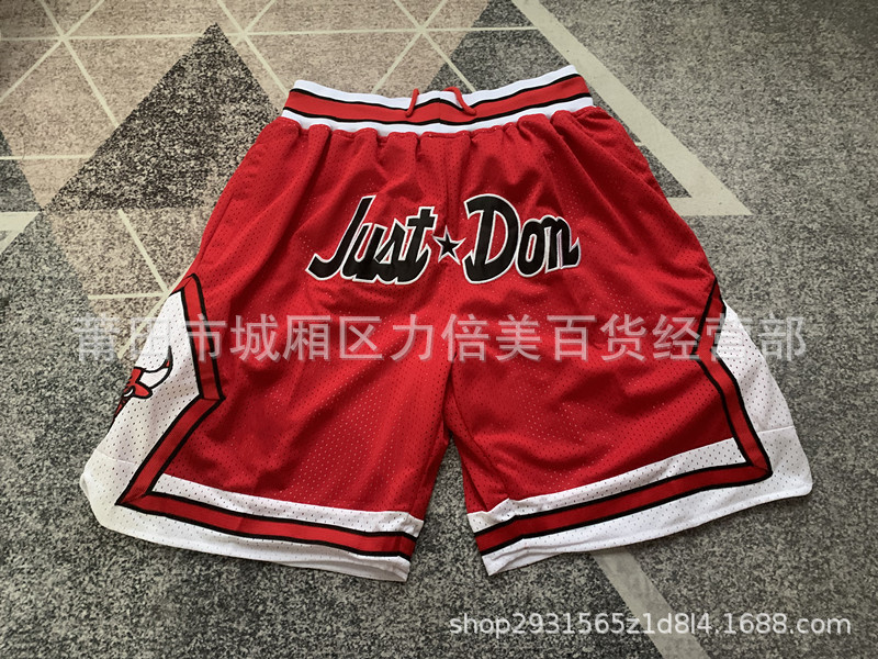 Comercio exterior pantalones de fútbol al por mayor Warriors Lakers 76 caliente Raptor mágico bolsillo bordado pantalones cortos pantalones de baloncesto NFL