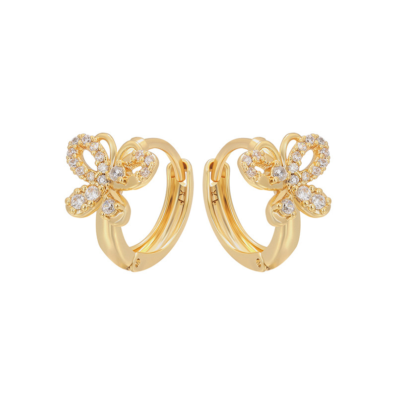 Xuping Europa y los Estados Unidos transfronterizos mariposa hueco círculo geométrico perfiles de orejas de aleación de cobre chapado 14k pendientes personalizados