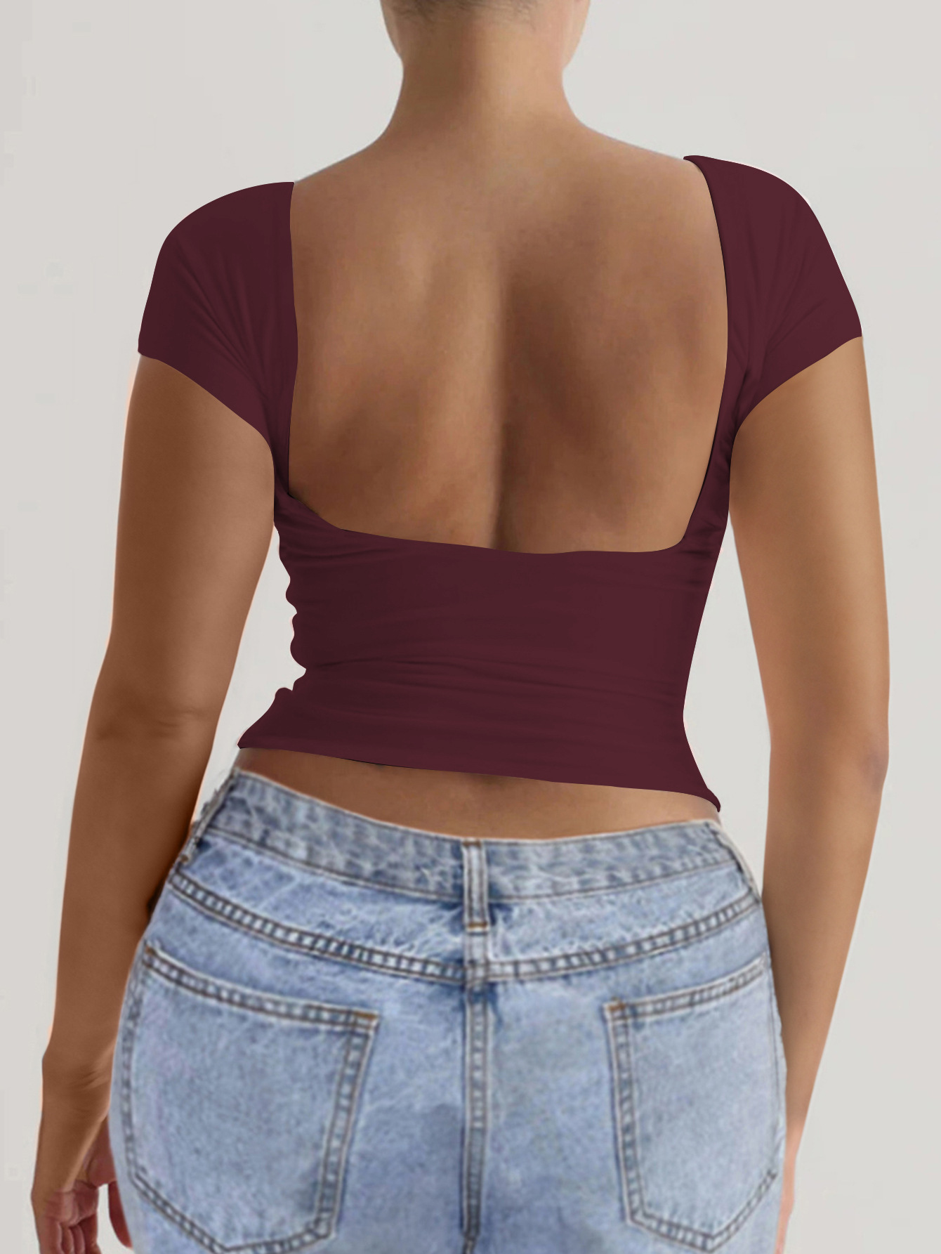 91g Weight Short Sleeve Sleeve Length Pullovers Placket Type Regular Sleeve Sleeve Type Spandex, Viscose fiber Fabric Type Regular Top Length T-shirt Tops Type Daily Occasion Round Neck Neckline Comfort Function Slim Fit Type Solid Color Pattern 2025 Spring and Summer Season Women's Gender Backless Design Streetwear Style Wholesale Women's Streetwear Solid Color Short Sleeve Backless T-Shirts 14