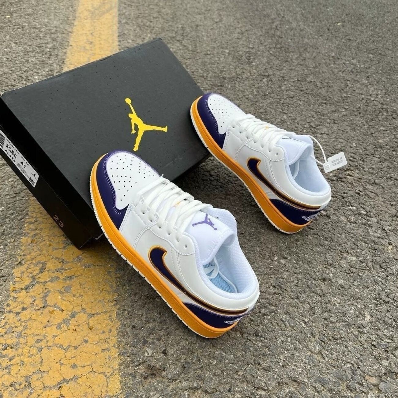 Chunyuan AJ1 Meituan negro, blanco y amarillo campus de moda baja pareja de hombres y mujeres zapatos de skate casuales