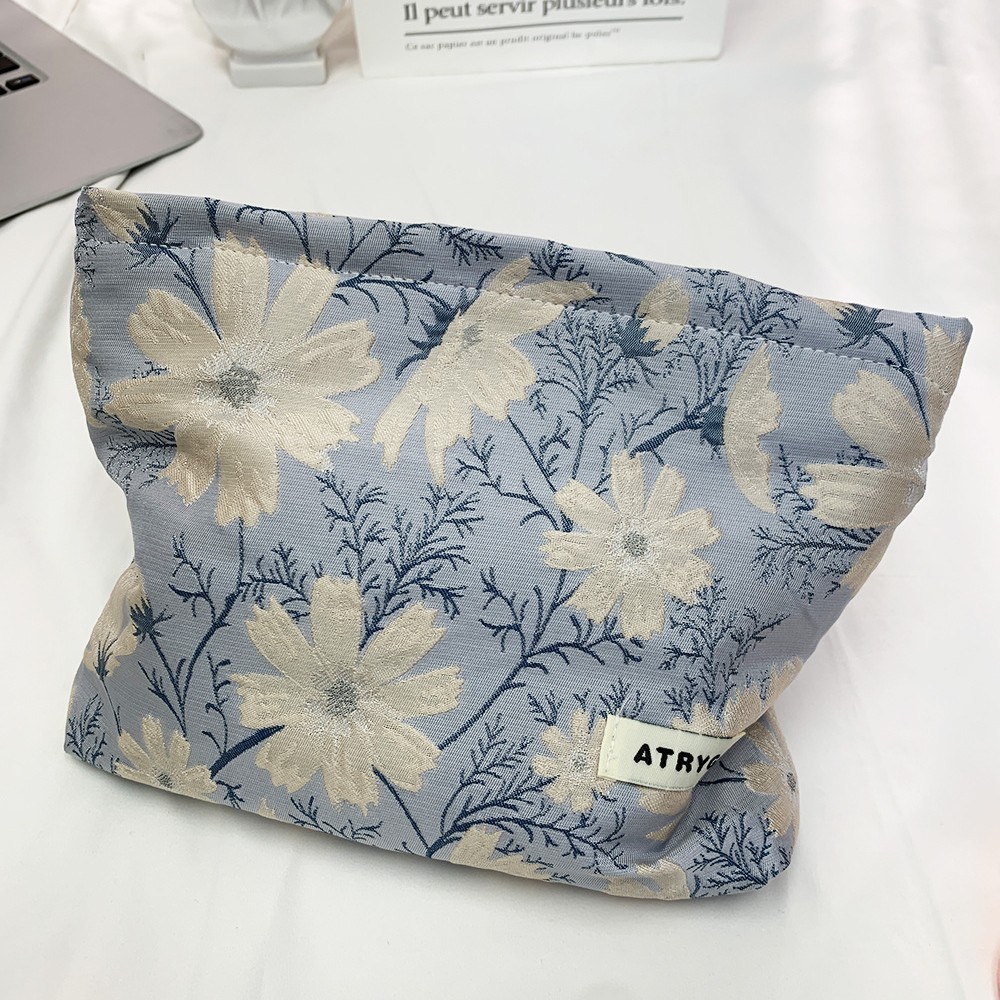 Bolsa de maquillaje una gran cantidad de flores Jacquard tejido Jacquard bolsa de almacenamiento de productos de cuidado de la piel de viaje bolsa de maquillaje portátil