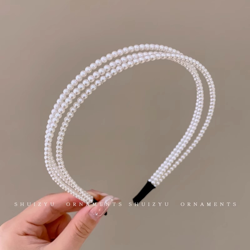 1 # Diadema de perlas multicapa.