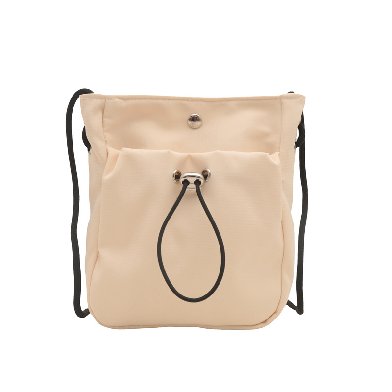 Bolsos de teléfono móvil de viento minimalistas para mujeres japonesas y coreanas bolsos de lona ligeros de cuerda de dibujo mini multifuncional bolsos de cambio de hombro