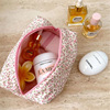 Fuchsia cosmetic bag for traveling, storage system with zipper, handheld storage bag, tape