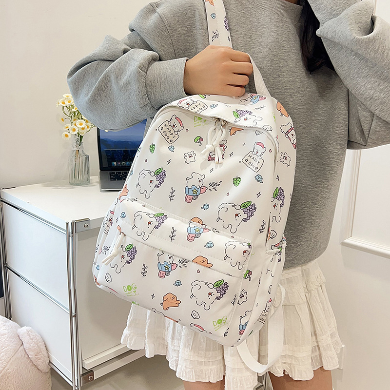 Nueva pequeña mochila fresca encantadora niña de secundaria secundaria estudiantes de mochila ligera de viaje mochila de gran capacidad