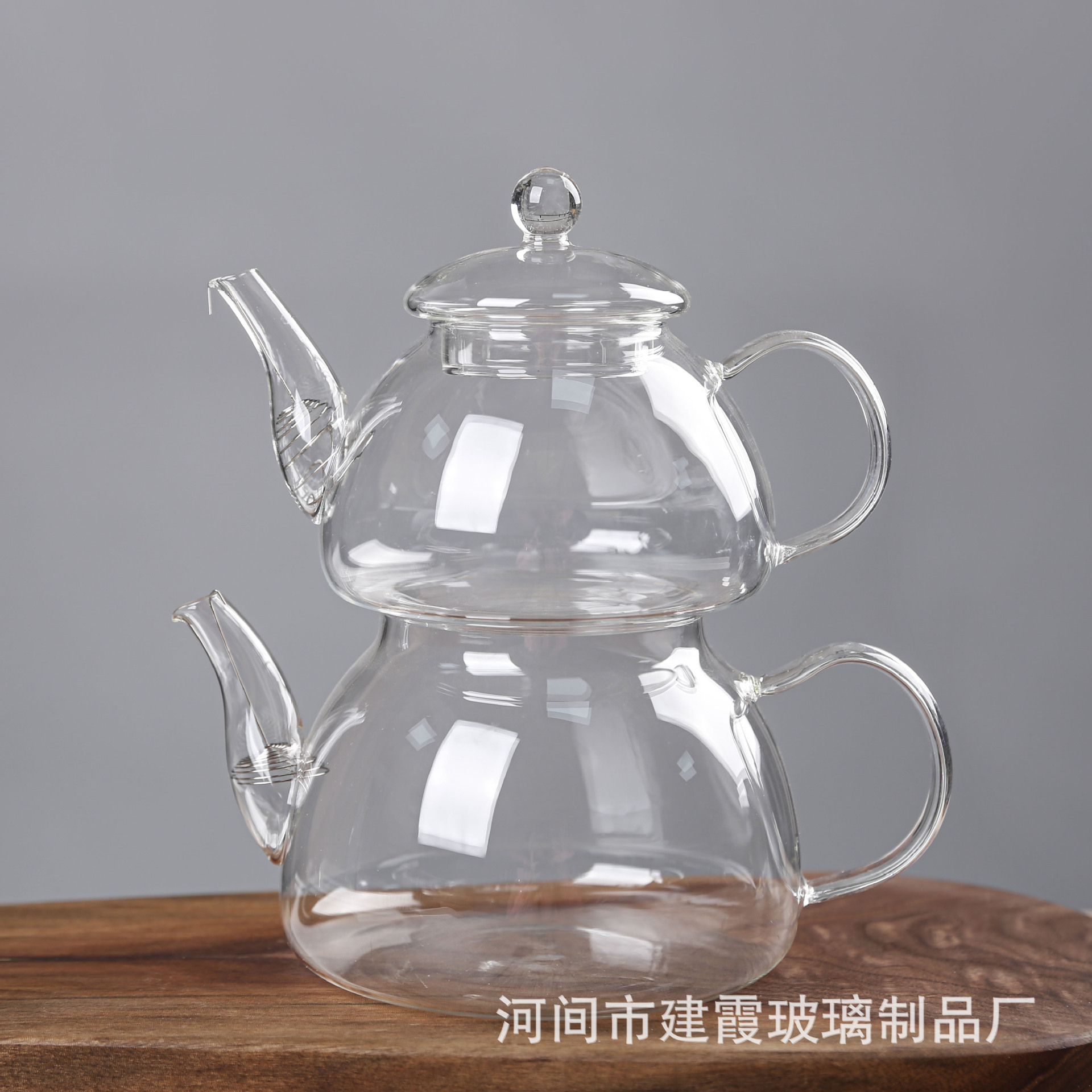 Tetera de borosilicato alto con infusor, tetera de vidrio resistente al calor, separación de té y agua, venta al por mayor para el hogar, diseño simple.