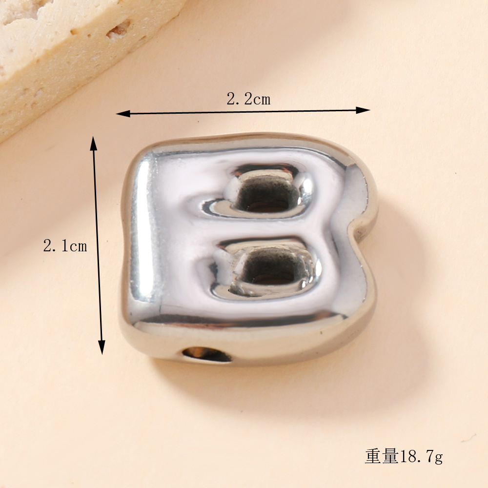 Colgante único venta cruzada de burbujas de fundición 26 collares de letras inglesas accesorios colgante DIY joyas de acero inoxidable