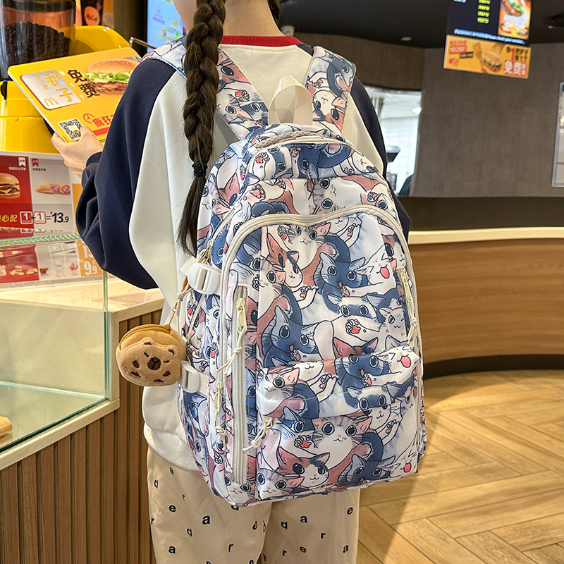 Cartoon Graffiti Large-Capacity Backpack for Men, High-End Lululemon Bag, Elementary School Student School Bag, New Junior High School Model