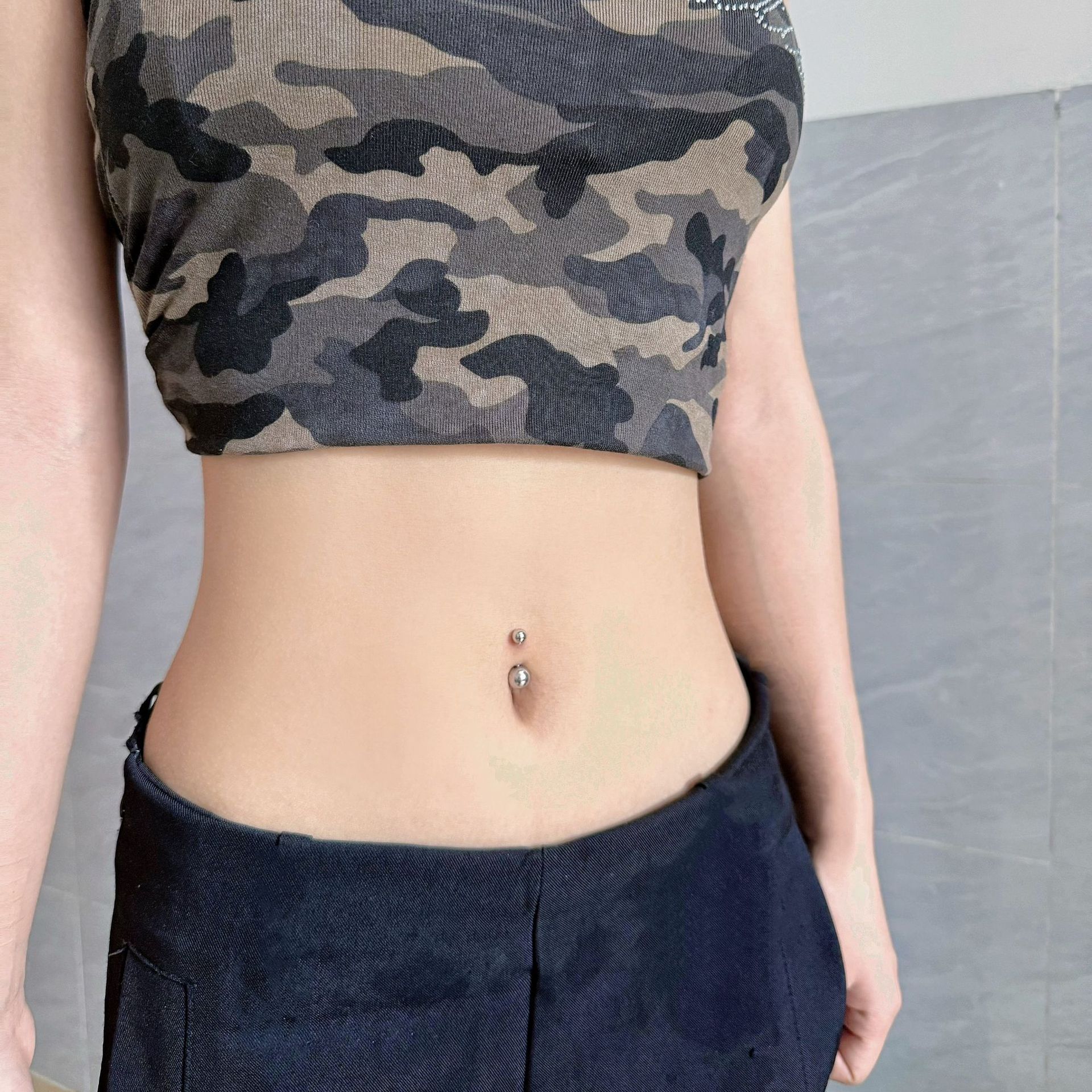 Silver pointed spike labret stud material detail