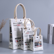 新款摆柜白卡印刷纸袋PVC透明皮手提单肩休闲包上班族手提购物袋