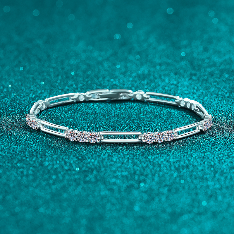 De Yilong S925 sterling silver bracelet with full moissanite stones, featuring a delicate hollow design, exuding a refined and sophisticated aesthetic, and is versatile enough to complement any outfit De Yilong S925 sterling silver bracelet with full moissanite stones, featuring a delicate hollow design, exuding a refined and sophisticated aesthetic, and is versatile enough to complement any outfit