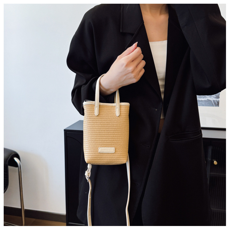Summer straw woven beach bag 2025 New style seaside vacation handbag, simple and versatile bucket bag, woven crossbody bag undefined