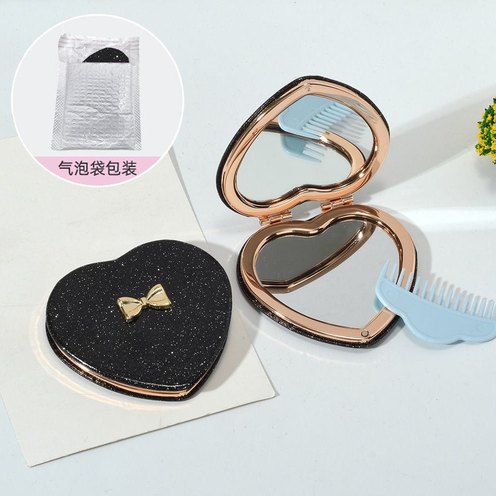 Espejo pequeño de amor de alto valor con mini dormitorio de estudiante espejo plegable de doble cara espejo de maquillaje portátil redondo