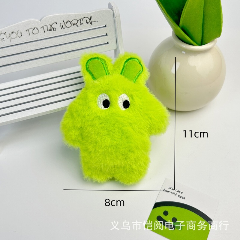 かわいい創意的なウサギのぬいぐるみのブローチがギシギシと言います。|undefined