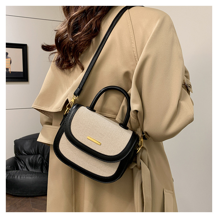 Bolsos de silla de mano de alta textura para mujeres 2026 nueva moda transfronteriza retro color contrastante empalme mochila de hombro