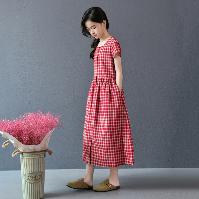 Falda de niña de estilo de vacaciones de bolsillo nuevo vestido a cuadros rojo de temperamento de longitud media falda de swing grande de manga corta de verano