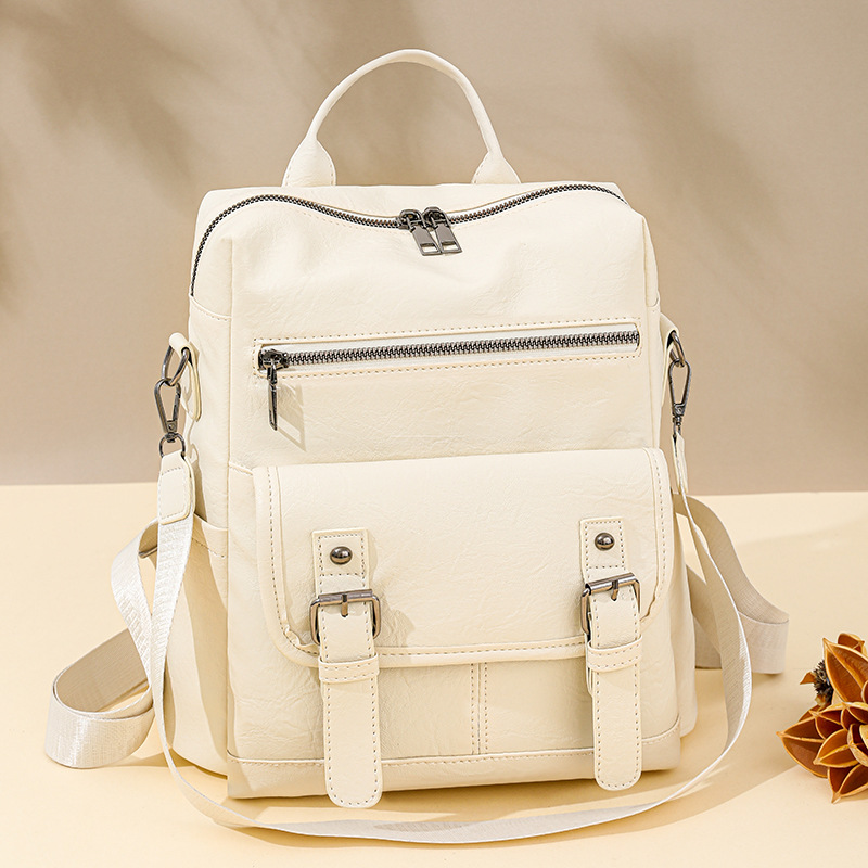 Inventario al por mayor transfronterizo nuevo estilo coreano retro mochila de mujer moda mochila de viaje multifuncional de cuero suave