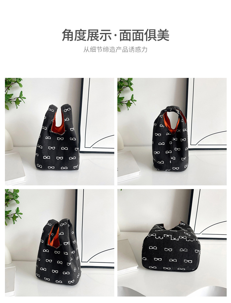 2025 New canvas handbag, a popular female cartoon bucket bag, versatile for Japan and South Korea, and an ins hand-held tote lunch box bag Item Picture